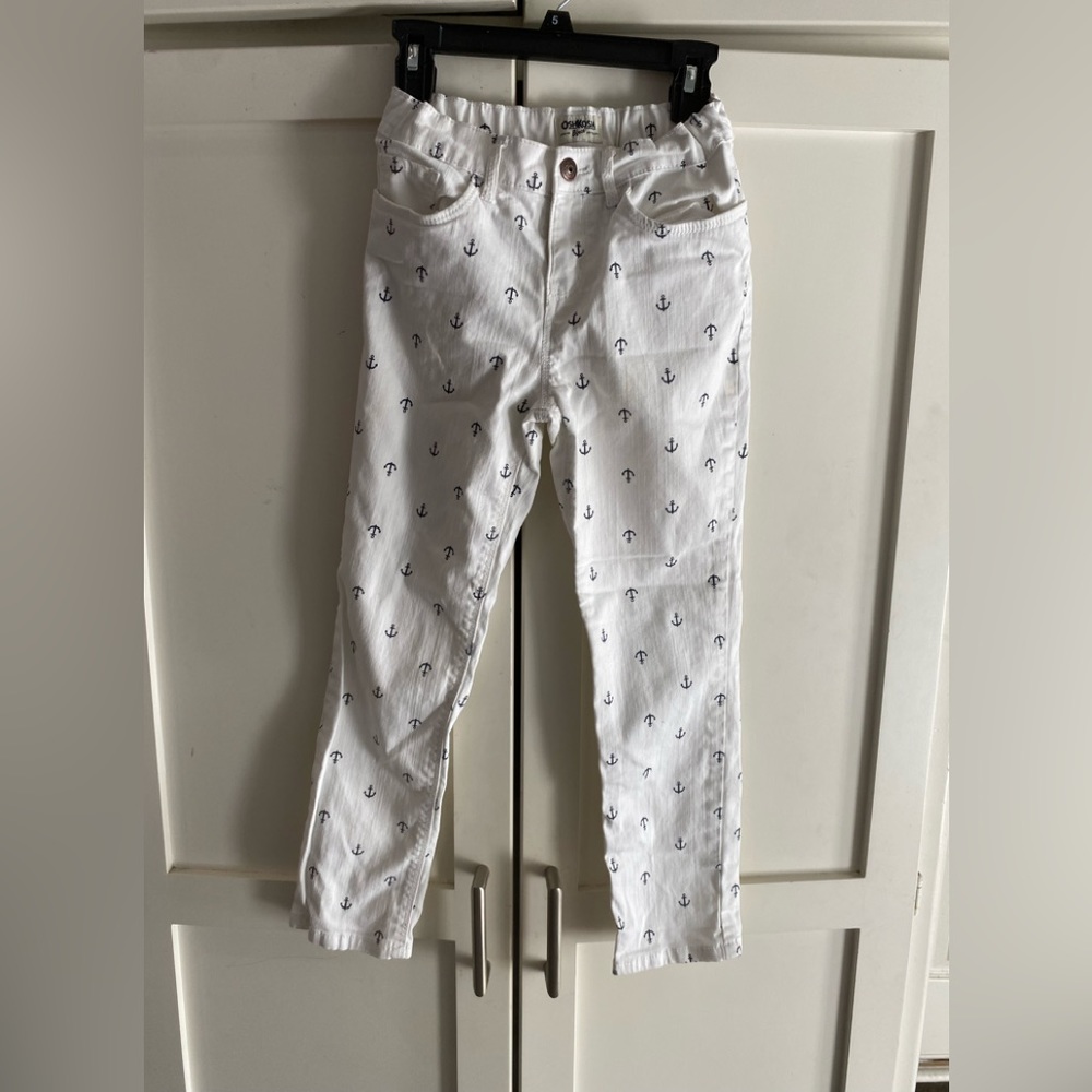 White pants, navy anchor detail. Child size 10. Adjustable waist inside, OshKosh